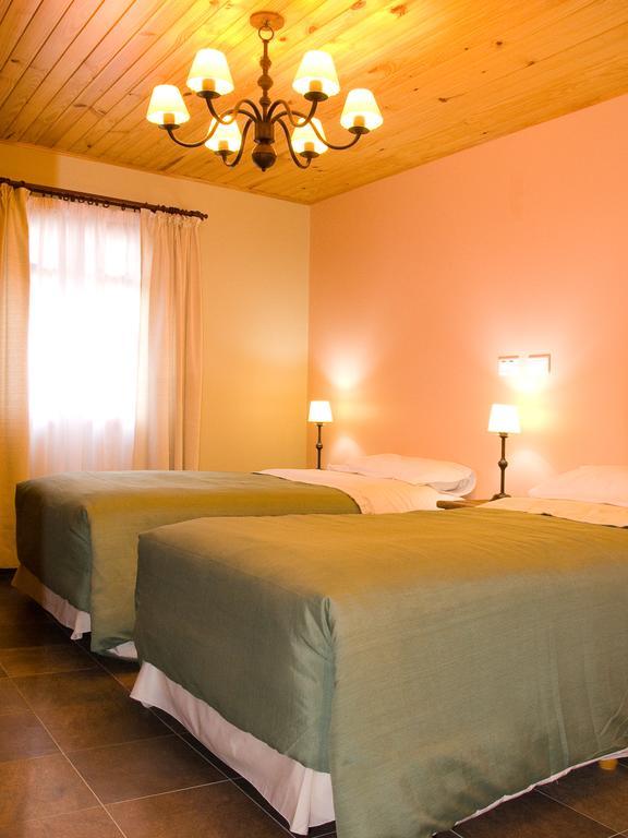 Hotel Confin Patagonico El Chaltén Habitación foto